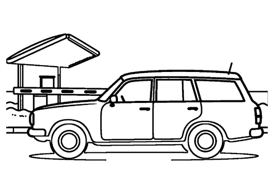 Ein klassischer Kombi mit Koffern steht im Winter unter dem alten Dach eines ehemaligen Grenzübergangs.