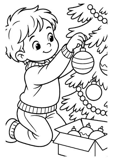 A smiling boy kneeling by a Christmas tree hangs a striped bauble on a branch, next to an open box of more ornaments