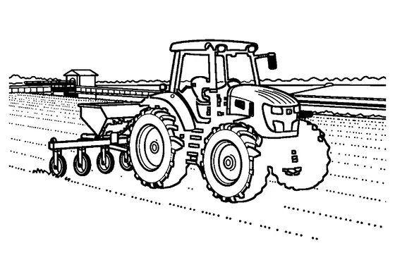 Un tracteur équipé d’un large semoir travaille en automne près d’un canal d’irrigation.
