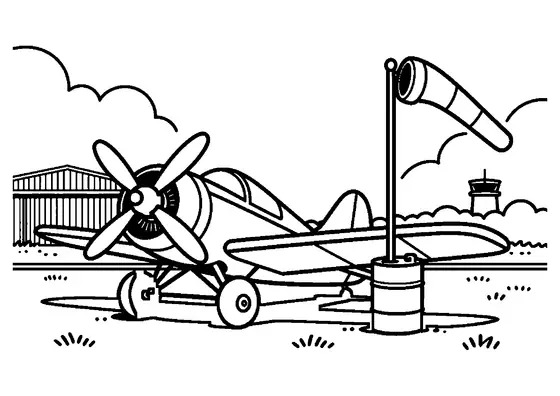 Un avión acrobático monomotor estacionado en un aeródromo de hierba frente a un hangar