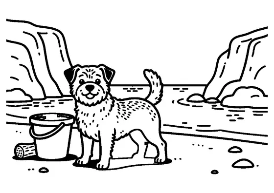 Un terrier de pie junto a un cubo y un tronco en la arena de una cala rodeada de rocas.