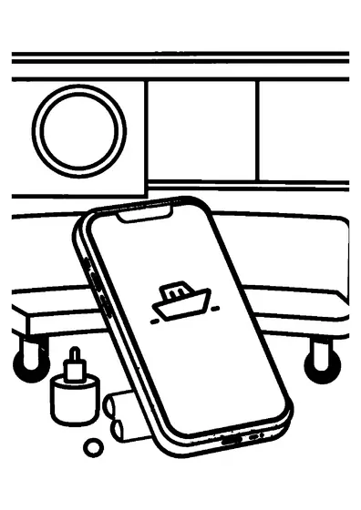 Un téléphone dans une coque à motif de vagues est posé près d’un chargeur et d’un casque audio sur la table d’une cabine de ferry.