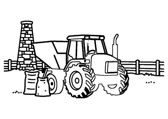 Tracteur équipé d'un épandeur conique pour la chaux, devant la tour d'un four à chaux de campagne.